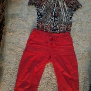 Peek a boo shoulders top with burnt orange capris